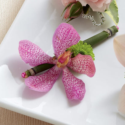 Pink Mokara Boutonniere – KEITH'S FLOWER SHOP, Mount Gilead OH