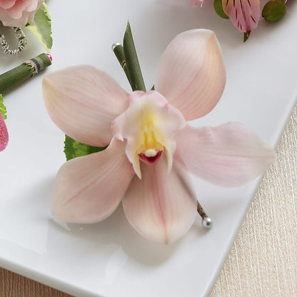 Pink Cymbidium Boutonniere – KEITH'S FLOWER SHOP, Mount Gilead OH